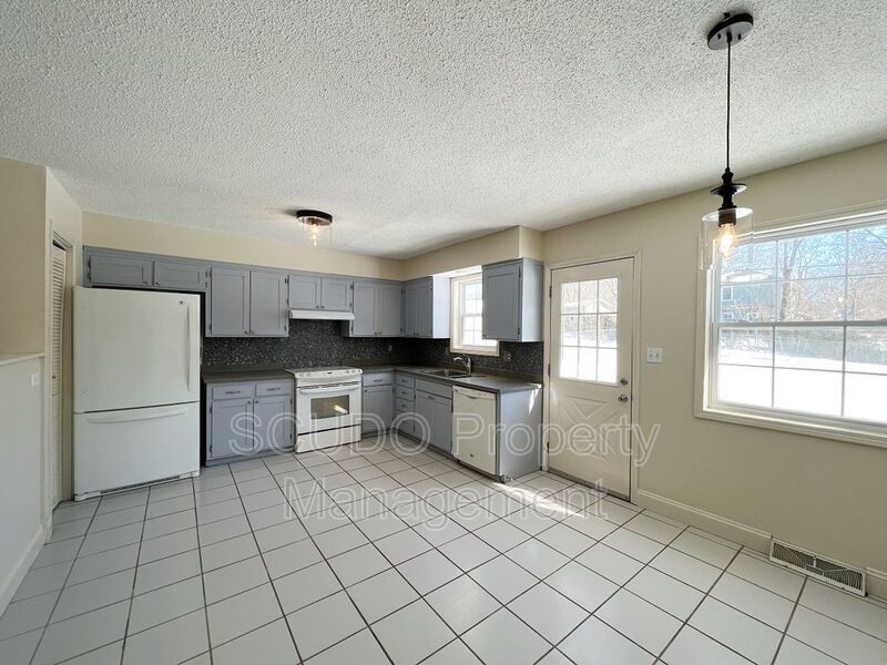 SEE IT NOW: Beautiful 3BR Home with Finished Basement, 2-Car Garage & Spacious Backyard in Lenexa! property image