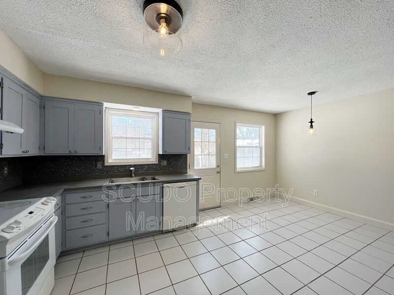 SEE IT NOW: Beautiful 3BR Home with Finished Basement, 2-Car Garage & Spacious Backyard in Lenexa! property image