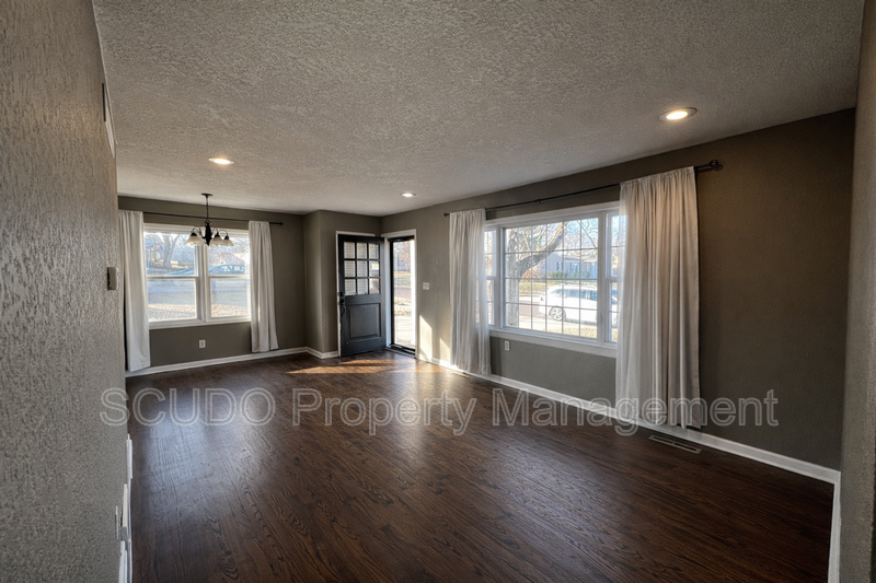 SEE IT NOW: Charming Home with Spacious Living, Modern Kitchen & Private Driveway in Overland Park! property image