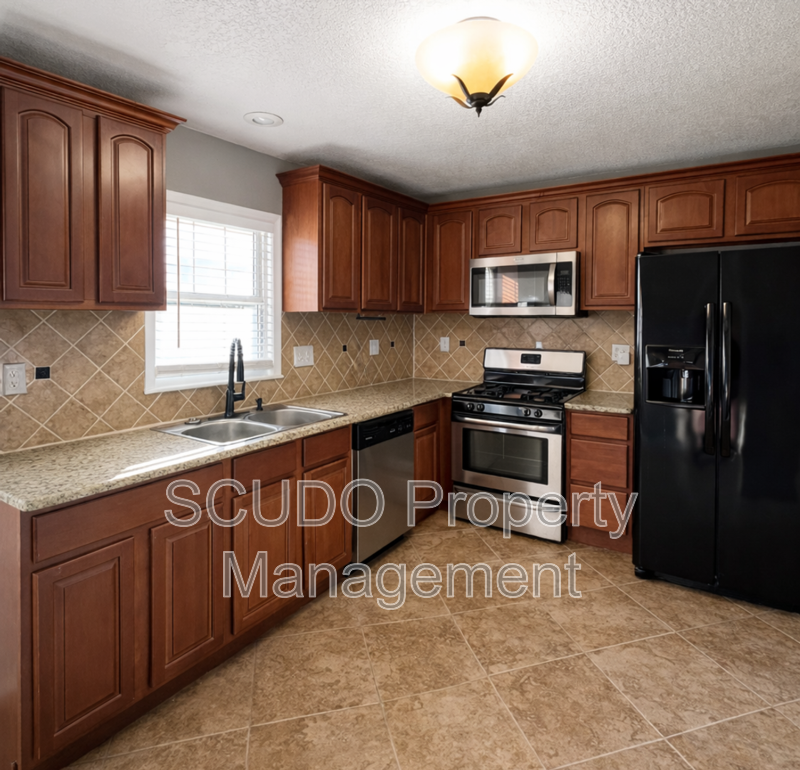 SEE IT NOW: Charming Home with Spacious Living, Modern Kitchen & Private Driveway in Overland Park! property image