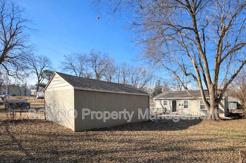 SEE IT NOW: Charming Home with Spacious Living, Modern Kitchen & Private Driveway in Overland Park! property image