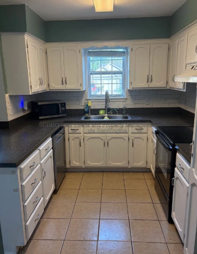 Spacious & Welcoming 4-Bedroom Home with Cozy Charm property image